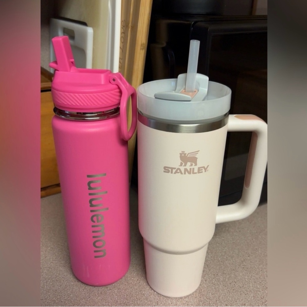 Stanley light pink Travel Mug and Pink Lululemon Water Bottle